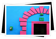 colourful pink and blue house front
